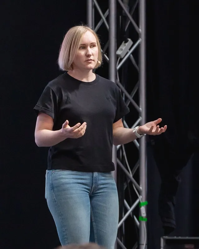Jessica Andersson speaking on stage at DevOpsDays Aarhus